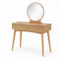 Coiffeuse en bois avec miroir rond et tiroirs en rotin